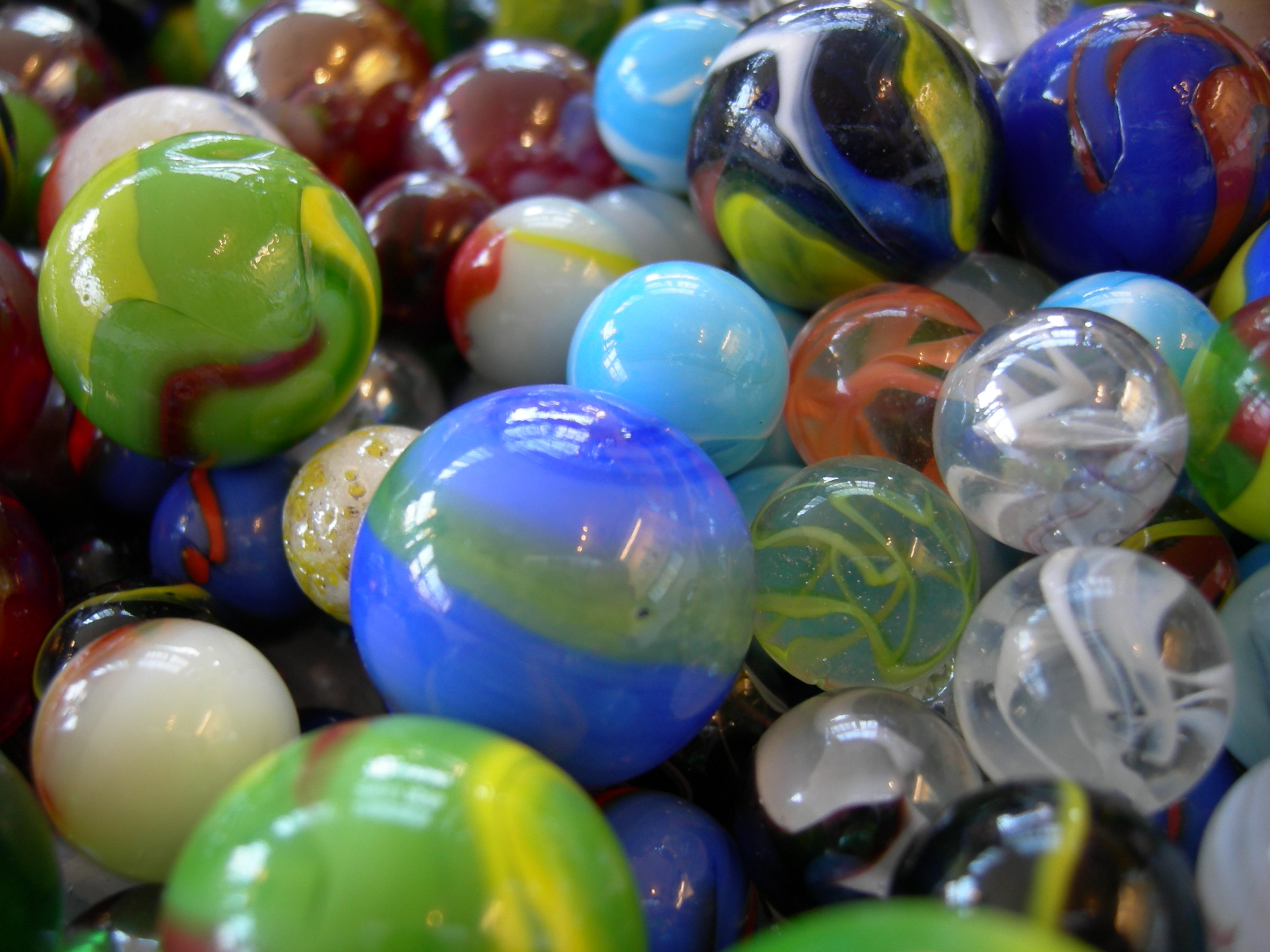 marbles of different sizes and colors